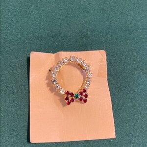 Gold Ring with Red and Green Bow